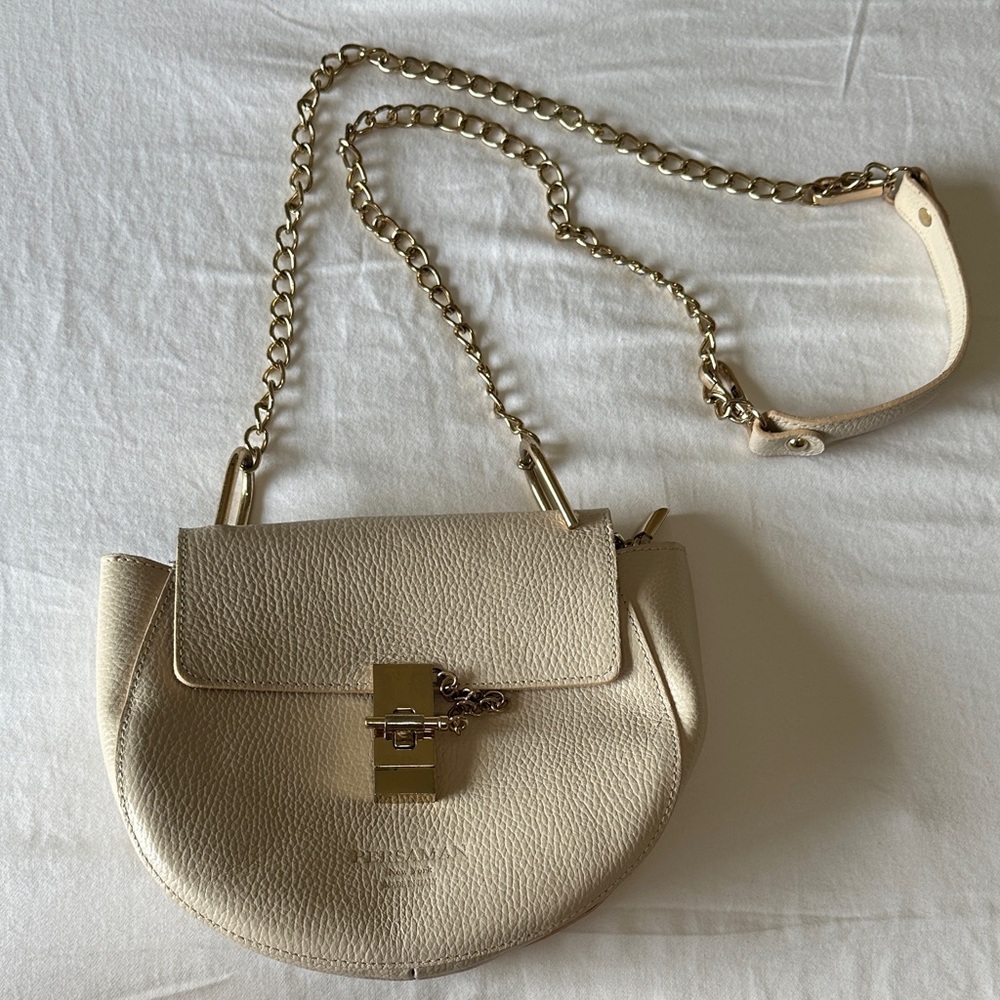 Persaman New York White genuine leather Pebble Bag. Made in Italy.